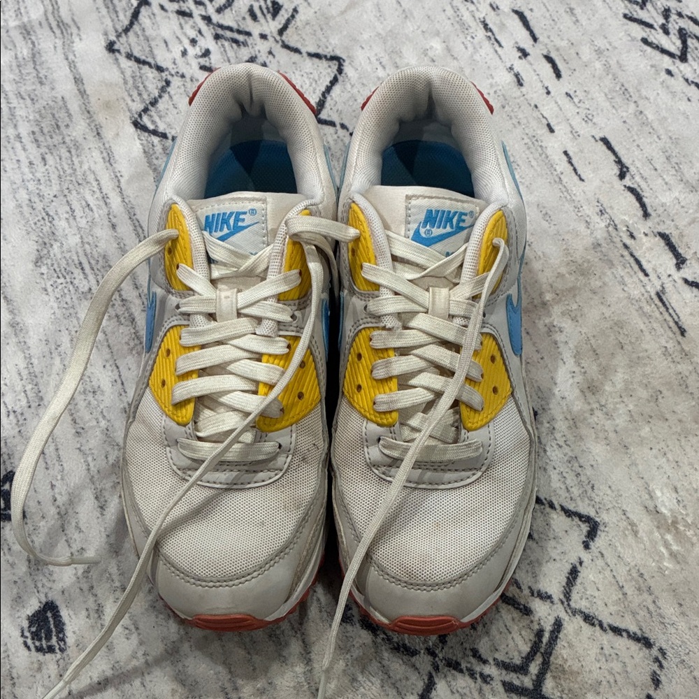 Nike Kids White, Blue & Yellow Sneakers with Red Heel Detail
